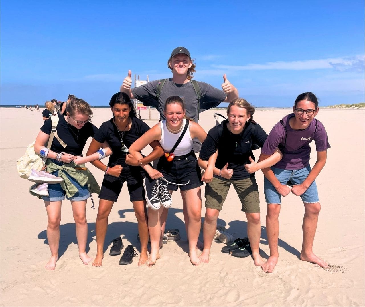 A happy group of sailingo teenagers on a day at the beach A happy group of sailingo teenagers on a day at the beach